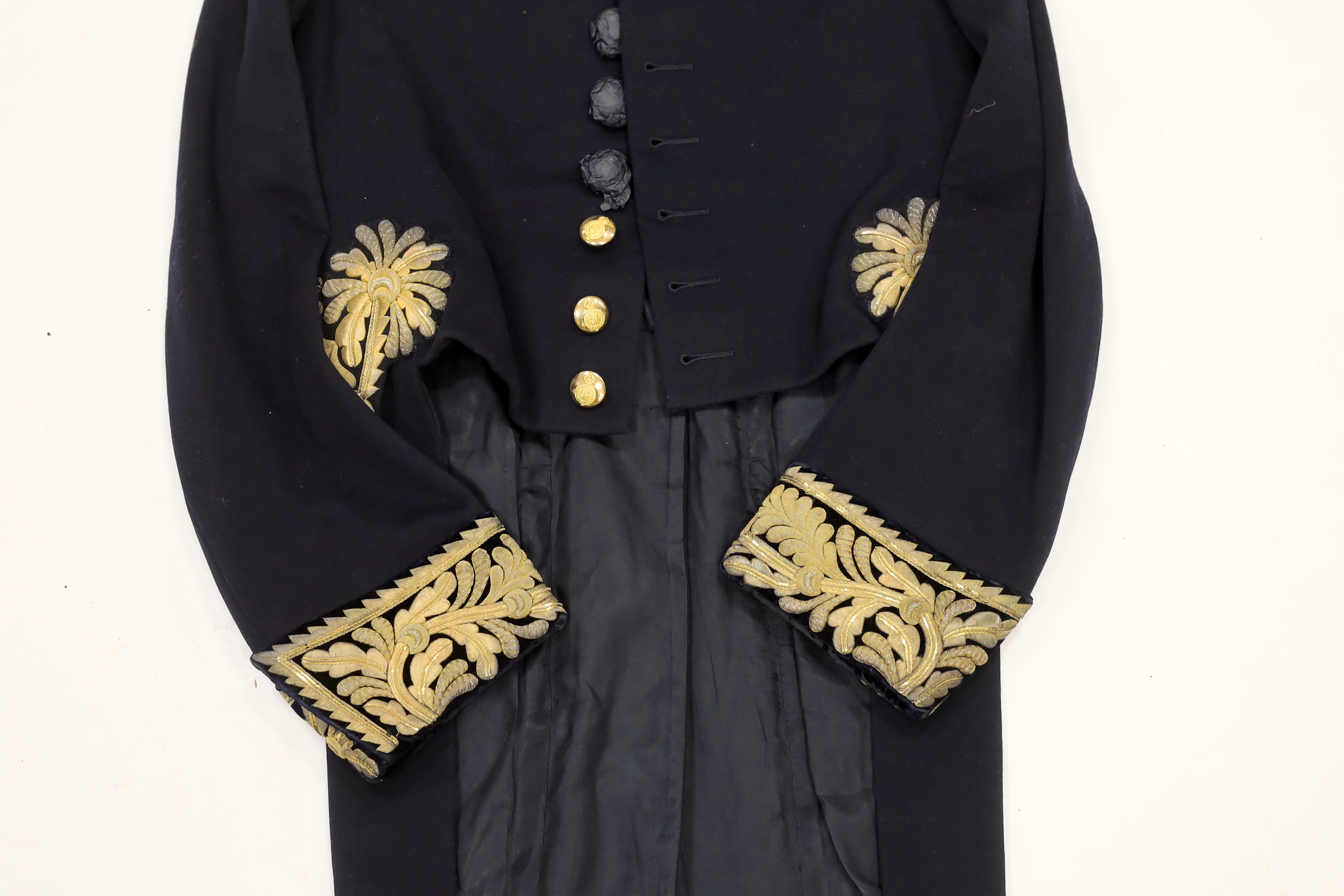 An early 20th century Royal Court tail coat or levee dress with gilt embroidery to collar and cuffs